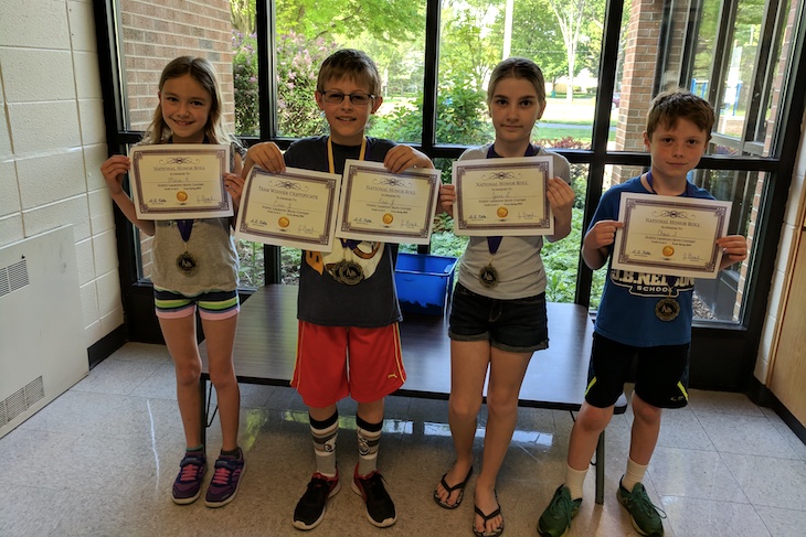<p>JBN National Honor Roll winners (from left): Maria Kadochnikova, Eric Yurkewicz, Jane Lishamer, and Chase Flannagan. Eric is also a Team Medal winner.</p>
