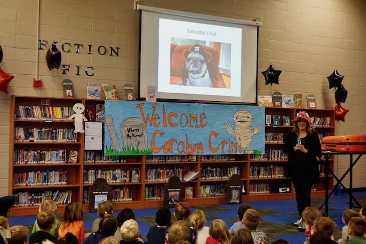 <p>Ms. Crimi confessed that she dresses up her dog “Emerson” in a different hat each day of the week. 🙂</p>
